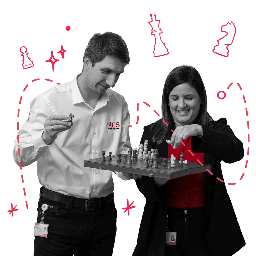 Two happy workers playing chess