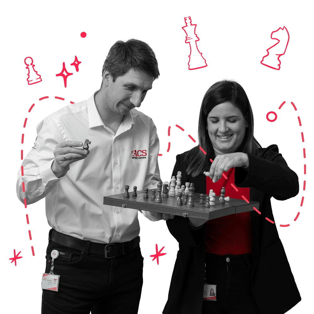 Two happy workers playing chess